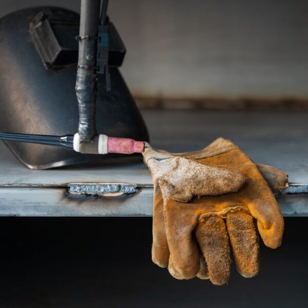 welding gloves on bench