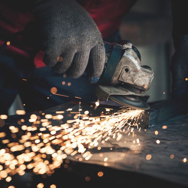 Person using a metal grinder